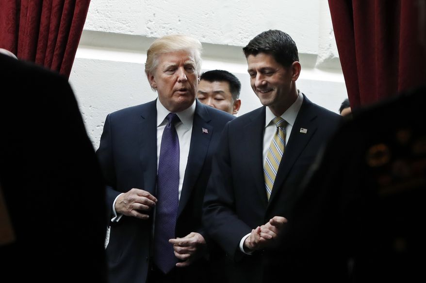 President Donald Trump, left, walks with House Speaker Paul Ryan of Wis., Thursday, Nov. 16, 2017, as they leave a meeting with House Republicans on Capitol Hill in Washington. (AP Photo/Jacquelyn Martin) ** FILE **