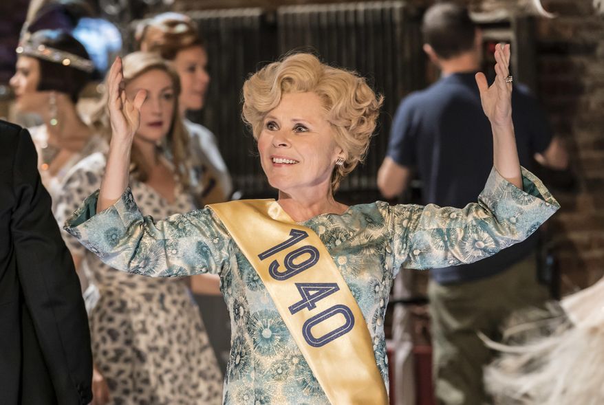 An Aug. 21, 2017 photo released by the National Theatre in London of Imelda Staunton as Sally Durant Plummer in Follies at the National Theatre. Imelda Staunton plays a woman on the verge of a nervous breakdown in "Follies," Stephen Sondheim's dizzying musical about a traumatic reunion of former Broadway showgirls. (Johan Persson/National Theatre via AP)