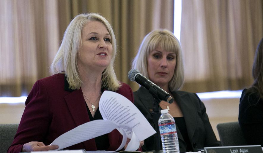 Lori Ajax, left, chief of the Bureau of Cannabis Control, speaks during the first public meeting of the Cannabis Advisory Committee, Thursday, Nov. 16, 2017, in Sacramento, Calif. The committee released the rules governing the nation's largest legal recreation marijuana market. (AP Photo/Rich Pedroncelli)