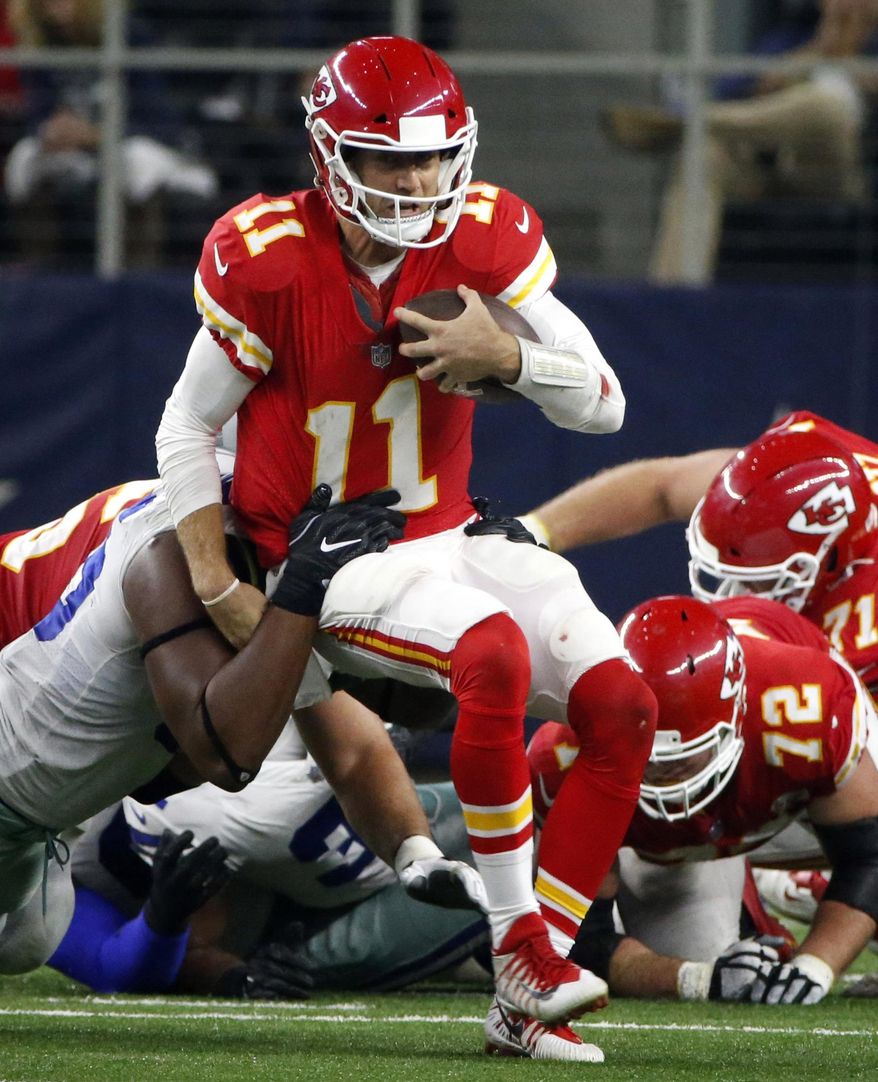 FILE - In this Sunday, Nov. 5, 2017, file photo, Dallas Cowboys defensive tackle David Irving, left, sacks Kansas City Chiefs quarterback Alex Smith (11) in the second half of an NFL football game in Arlington, Texas. The Chiefs hope a week off can serve as a reset to their season. They began 5-0 before losing three of their last four, and quarterback Alex Smith even threw an interception in a loss to Dallas just before the bye. (AP Photo/Michael Ainsworth, File)