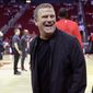 In this Oct. 13, 2017, file photo, new Houston Rockets owner Tilman Fertitta reacts before an NBA preseason basketball game against the San Antonio Spurs in Houston. Fertitta is interested in bringing an NHL hockey team to Houston, a possibility that did not exist under the NBA team’s previous regime. (AP Photo/Michael Wyke, File) **FILE**