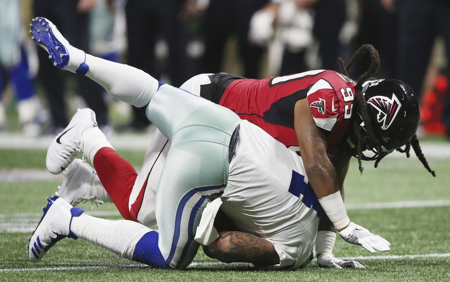 FILE- In this Nov. 12, 2017, file photo, Atlanta Falcons defensive end Adrian Clayborn (99) sacks Dallas Cowboys quarterback Dak Prescott (4) during the second half of an NFL football game in Atlanta. Clayborne&#39;s six sacks against Dallas might have come against backup tackles, but it was the latest sign of an improved unit. Atlanta plays at Seattle on Monday night. (AP Photo/John Bazemore, File)