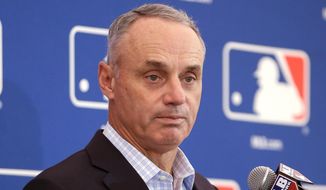Major League Baseball commissioner Rob Manfred delivers remarks during a news conference at the annual MLB baseball owners meetings, Thursday, Nov. 16, 2017, in Orlando, Fla. (AP Photo/John Raoux)