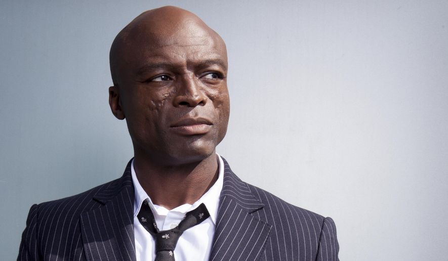 In this Oct 18, 2017 photo, Grammy Award-winning singer Seal poses for a portrait to promote his new album "Standards" at the London Hotel in West Hollywood, Calif. His tenth studio album was recorded with a band that included musicians who performed alongside Frank Sinatra and Ella Fitzgerald. (Photo by Rebecca Cabage/Invision/AP)