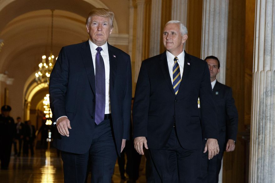 President Donald Trump and Vice President Mike Pence leave Capitol Hill after meeting with lawmakers on tax policy, Thursday, Nov. 16, 2017, in Washington. (AP Photo/Evan Vucci)
