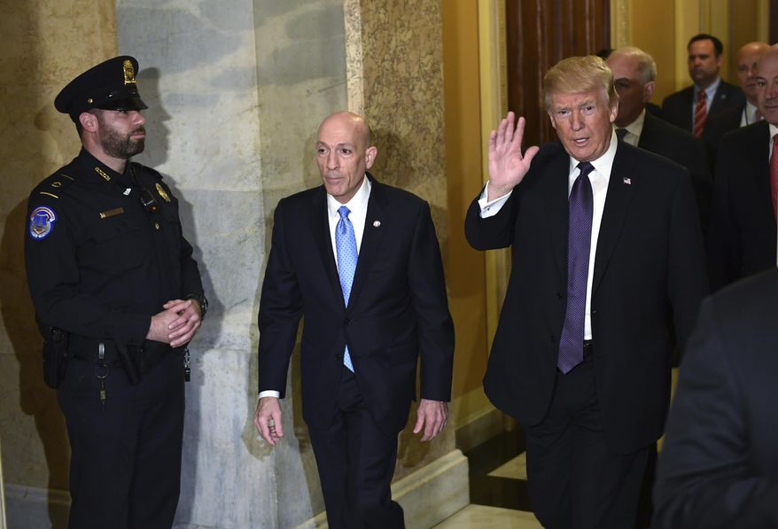 President Donald Trump arrives on Capitol Hill in Washington, Thursday, Nov. 16, 2017. Trump arrived at the Capitol for a pep rally with House Republicans, shortly before the chamber was expected to approve the tax bill over solid Democratic opposition. (AP Photo/Susan Walsh)