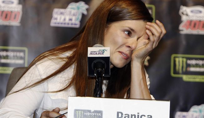 Danica Patrick wipes away tears as he speaks with the media during a news conference before Sunday&#x27;s NASCAR Cup Series auto race at Homestead-Miami Speedway in Homestead, Fla., Friday, Nov. 17, 2017. Patrick will end her full-time racing career after running in next year&#x27;s Daytona 500 and Indianapolis 500. ( AP Photo/Darryl Graham)