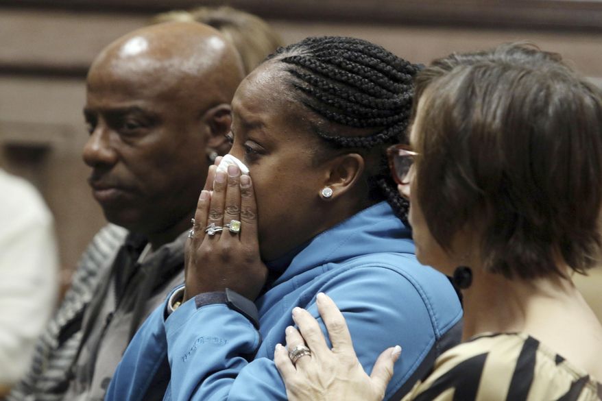 FILE - In this Friday Nov. 3, 2017 file photo, Katrina Johnson becomes emotional at the South Lee County Courthouse in Keokuk, Iowa after the jury returned a guilty verdict for Jorge Sanders-Galvez in the death of Johnson's transgender child, 16-year-old Kedarie Johnson. At least 25 transgender Americans have been homicide victims as of mid-November 2017, the highest annual total this decade, according to advocacy groups that have been monitoring the grim phenomenon and seeking ways to reduce the toll. (John Lovretta/The Hawk Eye via AP, Pool)