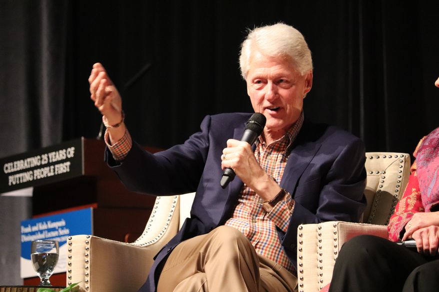 Former President Bill Clinton speaks at a gathering in Little Rock, Ark., on Saturday, Nov. 18, 2017, marking 25 years since his election. He and his wife Hillary Clinton appeared before about 2,600 people at the event in the Statehouse Convention Center. (AP Photo/Kelly P. Kissel)