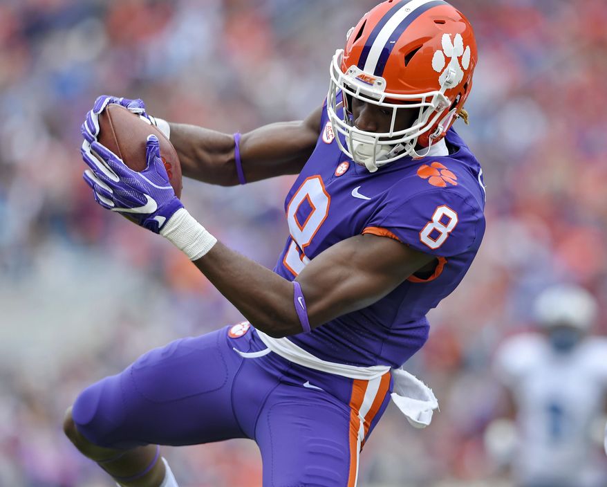 Clemson's Deon Cain pulls in a reception for a touchdown during the first half of an NCAA college football game against Citadel, Saturday, Nov. 18, 2017, in Clemson, S.C. (AP Photo/Richard Shiro)