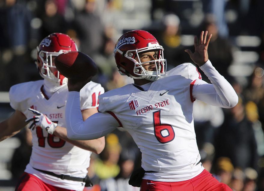 Fresno State quarterback Marcus McMaryion (6) prepares to pass the ball during the team's NCAA college football game against Wyoming on Saturday, Nov. 18, 2017, in Laramie, Wyo. (Josh Galemore/The Casper Star-Tribune via AP)