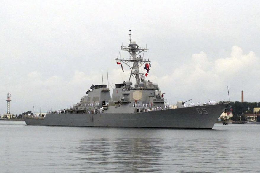 In this Aug. 8, 2016, file photo, the guided-missile destroyer USS Benfold arrives at the port in Qingdao, China. (AP Photo/Borg Wong, File)