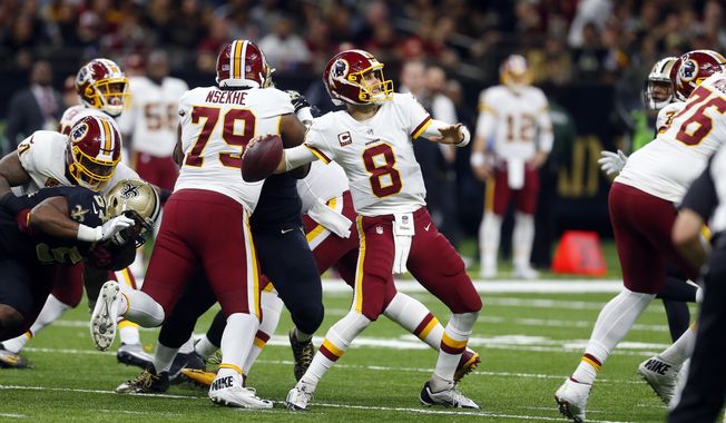 Washington Redskins quarterback Kirk Cousins (8) drops back to pass in the second half of an NFL football game against the New Orleans Saints in New Orleans, Sunday, Nov. 19, 2017. (AP Photo/Butch Dill)