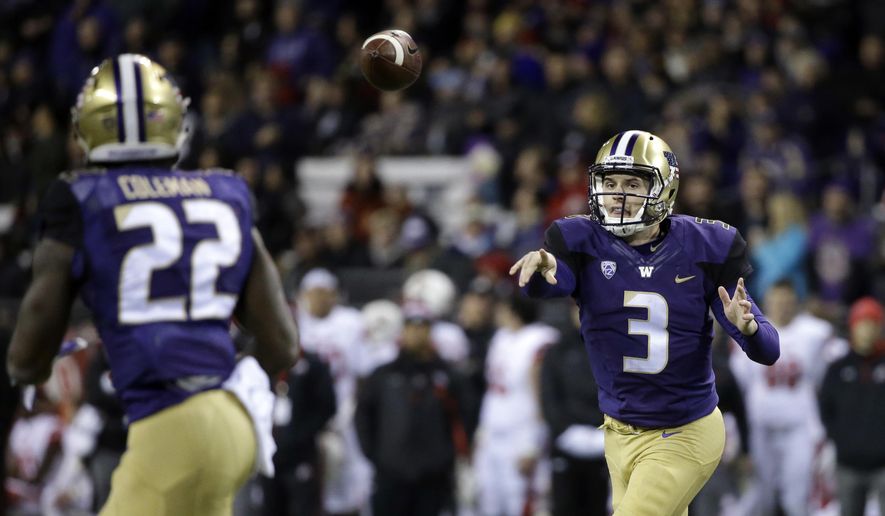 Washington quarterback Jake Browning (3) throws a pass to Lavon Coleman for a 6-yard touchdown against Utah during the first half of an NCAA college football game Saturday, Nov. 18, 2017, in Seattle. (AP Photo/Elaine Thompson)