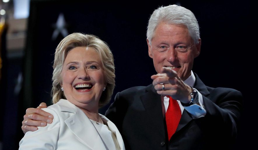 Hillary and Bill Clinton. (Associated Press) ** FILE **