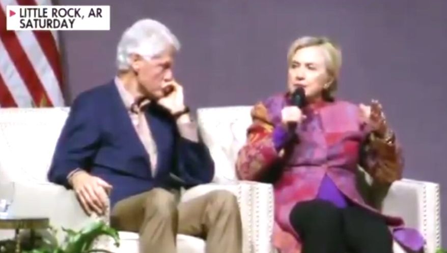 Former President Bill Clinton listens to Hillary Clinton discuss his tenure in the White House, Nov. 18, 2017. (Image: Fox News Channel screenshot)