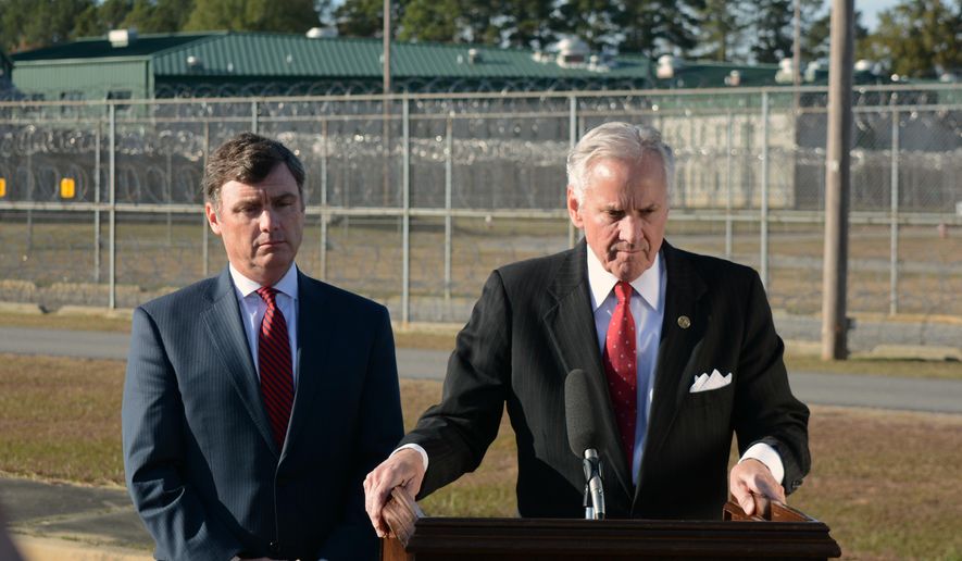 South Carolina Corrections Director Bryan Stirling, left, and Gov. Henry McMaster stand outside the state's death row at Broad River Correctional Institution in Columbia, S.C. Stirling and McMaster announced Monday the state doesn't have the drugs it needs for lethal injection and can't carry out an execution scheduled for December 1. (AP Photo/Meg Kinnard)