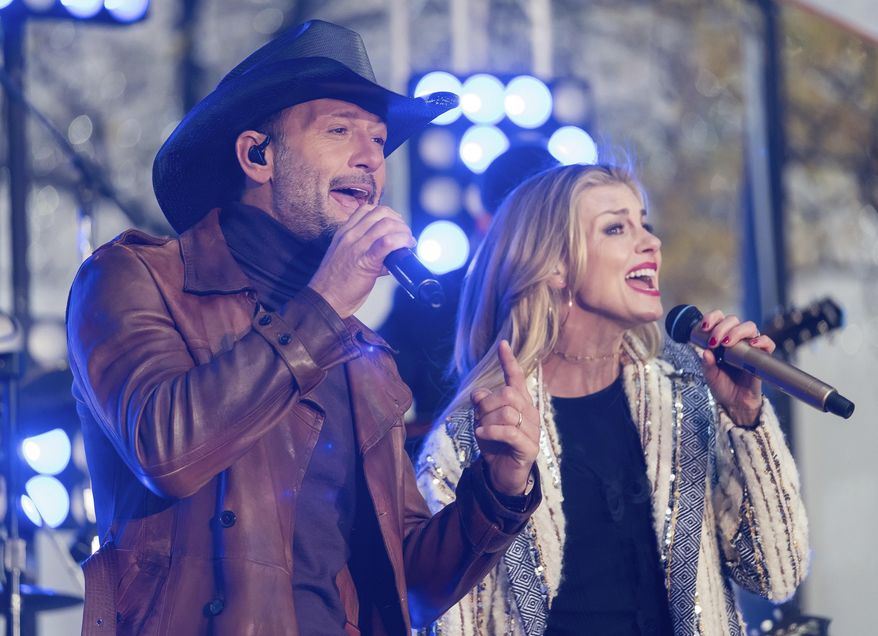 Tim McGraw and Faith Hill perform on NBC's "Today" show at Rockefeller Plaza on Friday, Nov. 17, 2017, in New York. (Photo by Charles Sykes/Invision/AP)