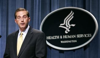 In this June 8, 2006 file photo, then Deputy Health and Human Services Secretary Alex Azar meets reporters at the HHS Department in Washington.  (AP Photo/Evan Vucci) **FILE**