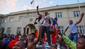 Zimbabweans took to the streets of the capital of Harare after learning that embattled President Robert Mugabe, who ruled the country for 37 years, would step down shortly after the nation&#39;s parliament had initiated impeachment proceedings against him. (Associated Press)