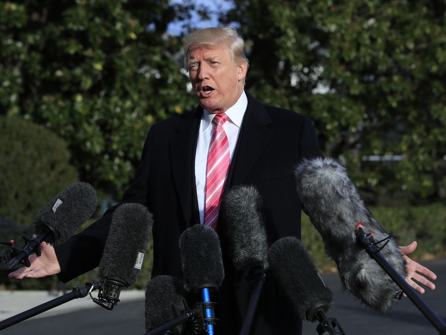 President Donald Trump speaks to reporters before leaving the White House, Tuesday, Nov. 21, 2017, in Washington for a Thanksgiving trip to Mar-a-Lago estate in Palm Beach, Fla. (AP Photo/Manuel Balce Ceneta) ** FILE **