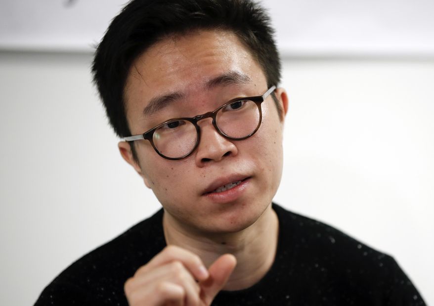 Plaintiff Nurimaro Park, 26-year-old resident of Fairfax, Va., speaks during a news conference at the Legal Aid Justice Center in Falls Church, Va., Tuesday, Nov. 21, 2017, to announce that he and plaintiff Jonathan Alvarenga Recinos, 19-year-old resident of Alexandria, Va., have filed a lawsuit seeking to have their Deferred Action for Childhood Arrivals, DACA, reinstated and extended for two years. (AP Photo/Carolyn Kaster)