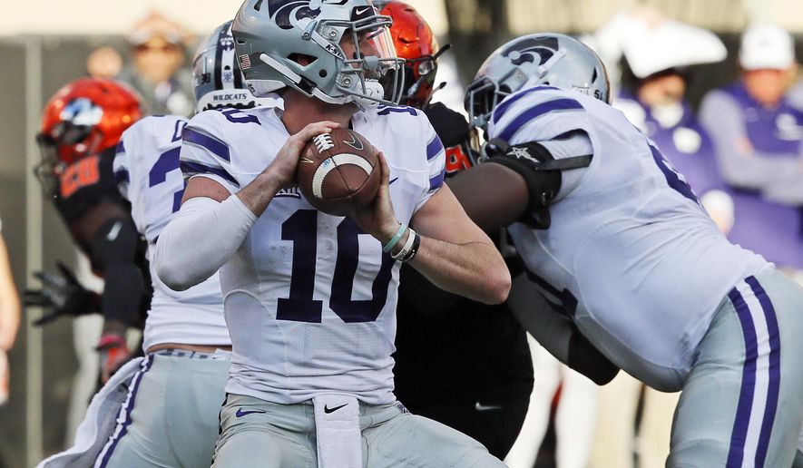 Kansas State quarterback Skylar Thompson (10) throws in the first half of an NCAA college football game against Oklahoma State in Stillwater, Okla., Saturday, Nov. 18, 2017. Kansas State won 45-40.(AP Photo/Sue Ogrocki)