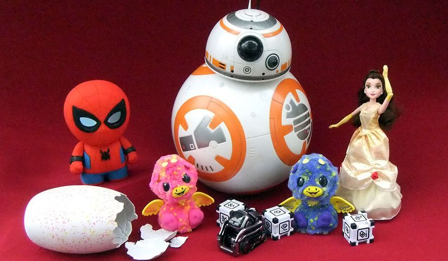 Some of the coolest robots and interactive toy gifts include Sphero&#x27;s Spider-Man,  Spin Master&#x27;s Hatchimals Surprise and BB-8, Anki&#x27;s Cozmo and Hasbro&#x27;s Princess Belle. (Photograph by Joseph Szadkowski / The Washington Times)