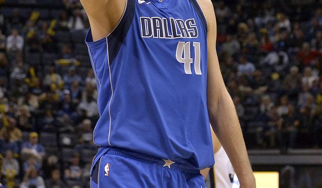 Dallas Mavericks forward Dirk Nowitzki (41) walks off of the court at the end of the first half of an NBA basketball game against the Memphis Grizzlies Wednesday, Nov. 22, 2017, in Memphis, Tenn. (AP Photo/Brandon Dill)