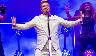 FILE - In this July 9, 2017 file photo, Nick Carter of the Backstreet Boys performs during the Festival d&#39;ete de Quebec in Quebec City, Canada. Carter says he’s “shocked and saddened” by accusations made by a singer who said he raped her about 15 years ago. Melissa Schuman of the girl group Dream wrote in a blog post that she was “forced to engage in an act against my will.” She said the Backstreet Boy took her virginity. (Photo by Amy Harris/Invision/AP, File)