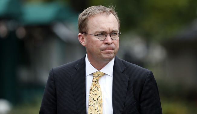 White House Budget Director Mick Mulvaney is in a battle to be temporary director of the Consumer Financial Protection Bureau. President Trump named him within a few hours after outgoing director Richard Cordray made a move Friday to seat his own deputy. (Associated Press/File)
