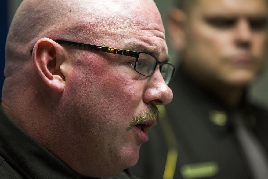 Lapeer County Sheriff Scott McKenna discusses a police chase that led to the death of Oakland County Sheriff's Deputy Eric Overall on Friday, Nov. 24, 2017, at the Lapeer County Sheriff's Office in Lapeer, Mich. (Terray Sylvester/The Flint Journal-MLive.com via AP)
