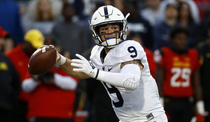 Penn State quarterback Trace McSorley throws to a receiver in the first half of an NCAA college football game against Maryland in College Park, Md., Saturday, Nov. 25, 2017. (AP Photo/Patrick Semansky)