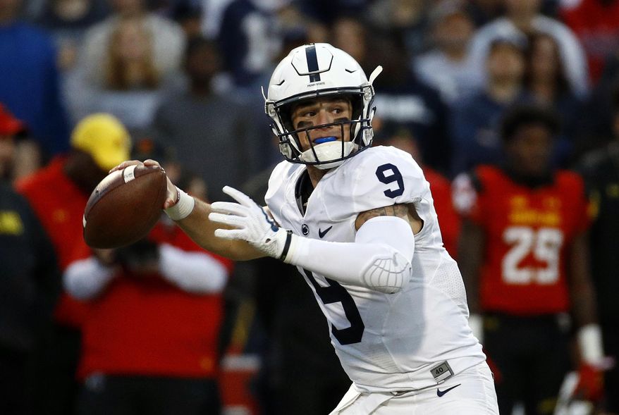 Penn State quarterback Trace McSorley throws to a receiver in the first half of an NCAA college football game against Maryland in College Park, Md., Saturday, Nov. 25, 2017. (AP Photo/Patrick Semansky)