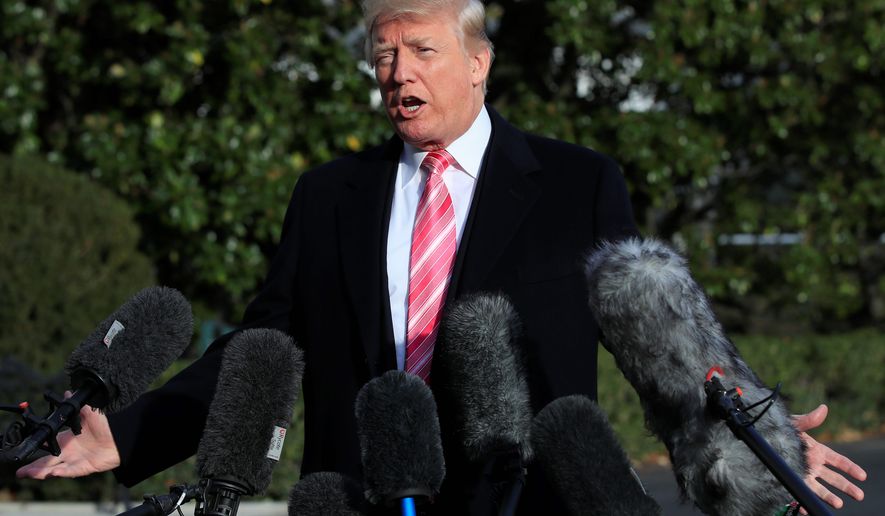 President Trump speaks to reporters before leaving the White House on Tuesday for a Thanksgiving trip to Mar-a-Lago in Palm Beach, Florida. (ASSOCIATED PRESS)