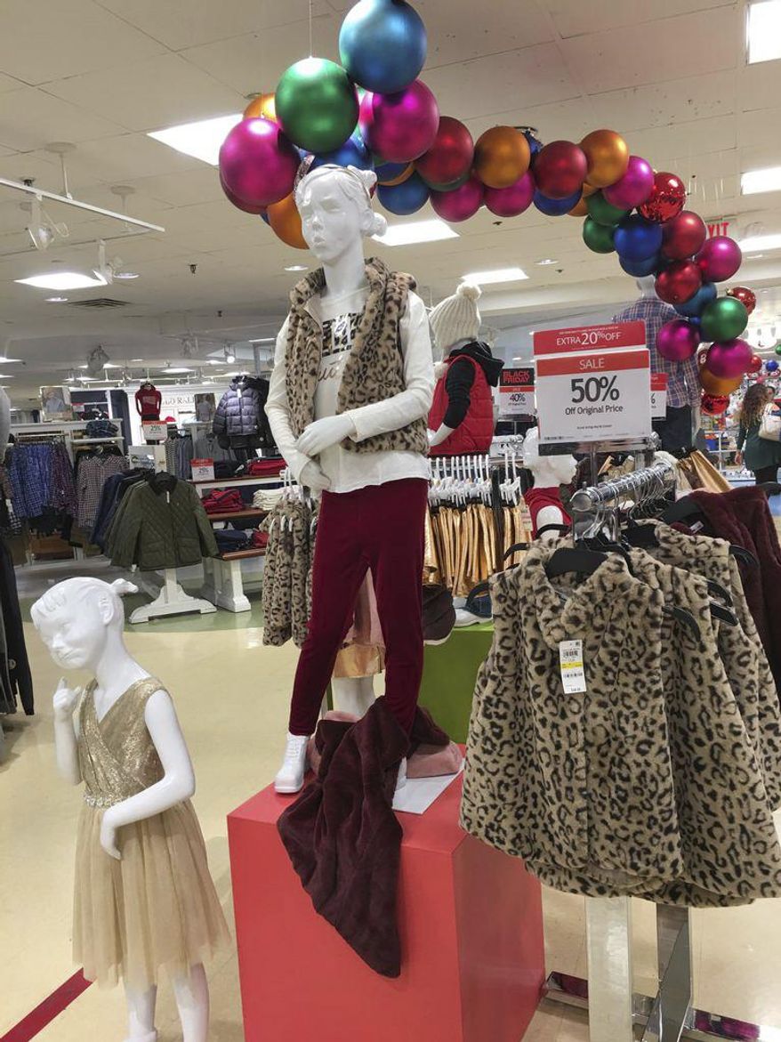 A children&#39;s clothing display at Macy&#39;s at Garden State Plaza, Saturday, Nov. 25, 2017, in Paramus, N.J. Parking lots were full and shopping bags were plentiful in some places Saturday as holiday gift-seekers were out looking for bargains, even as the competition among retailers to offer earlier deals and snag customers first has pulled sales forward. (AP Photo/Anne D&#39;Innocenzio)