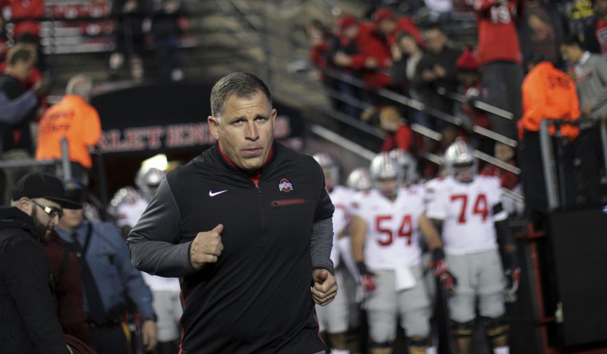 FILE- This Sept. 30, 2017 file photo shows former Rutgers football head coach, now Ohio State associate head coach/defensive coordinator Greg Schiano running onto the field before an NCAA college football game against Rutgers in Piscataway, N.J. Ohio State coach Urban Meyer says Tennessee has contacted Schiano about its head coaching vacancy. Meyer didn&#39;t have any additional details about Tennessee&#39;s potential interest in his defensive coordinator. Tennessee is seeking a new coach after firing Butch Jones two weeks ago. Schiano posted a 68-67 record as Rutgers&#39; coach from 2001-11. (AP Photo/Mel Evans, file) **FILE**