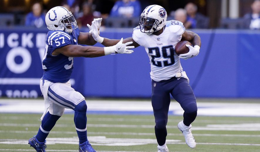 Tennessee Titans' DeMarco Murray (29) runs against Indianapolis Colts' Jon Bostic (57) during the second half of an NFL football game, Sunday, Nov. 26, 2017, in Indianapolis. Tennessee won 20-16. (AP Photo/Michael Conroy)