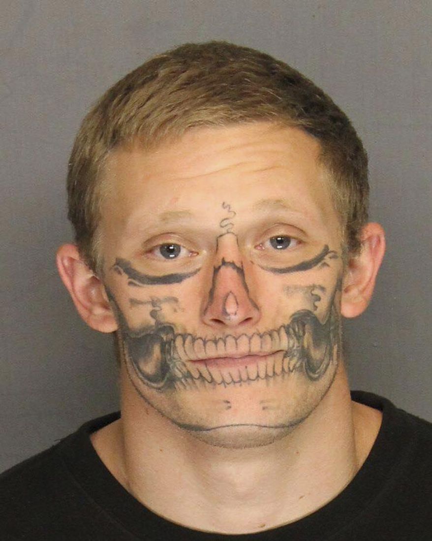 This undated photo provided by the San Joaquin County Sheriff's Office shows inmate Corey Hughes. Authorities said Hughes has escaped from a work crew in central California. The San Joaquin County Sheriff's Office says the 27-year-old was discovered missing from his work crew near Interstate 5 in Stockton on Monday, Nov. 27, 2017. (San Joaquin County Sheriff's Office via AP)