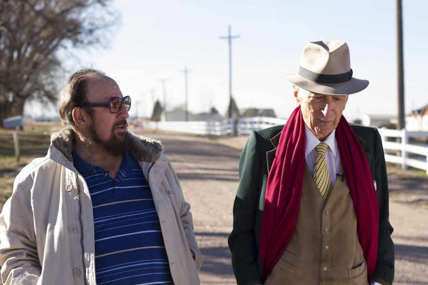 This image released by Netflix shows Gerald Foos, a former Colorado motel owner who spied on his guests, left, celebrated writer Gay Talese in the documentary "Voyeur," by filmmakers Myles Kane and Josh Koury. (Cris Moris/Netflix via AP)