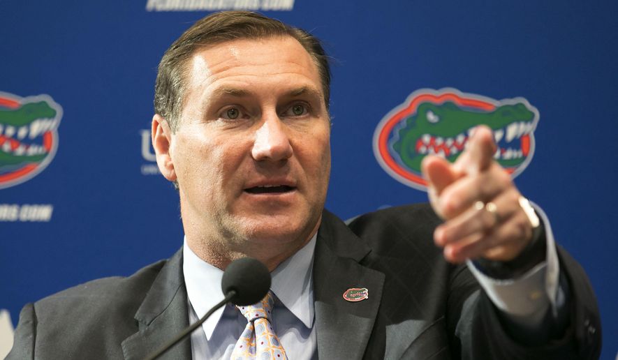 Dan Mullen, the new head football coach at the University of Florida, is introduced during a news conference in Gainesville, Fla., on Monday, Nov. 27, 2017. (Alan Youngblood/Star-Banner via AP)