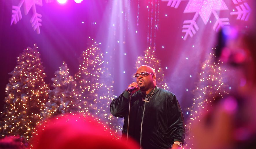 Rapper CeeLo Green performs at the annual Hollywood Christmas Parade in Los Angeles on Sunday, Nov. 26, 2017. Thousands of people lined the streets of Hollywood for the annual Christmas Parade. The crowds gathered Sunday night to watch as large balloons, musical performances and vintage cars from television shows and movies passed through Hollywood. (AP Photo/Mike Balsamo)