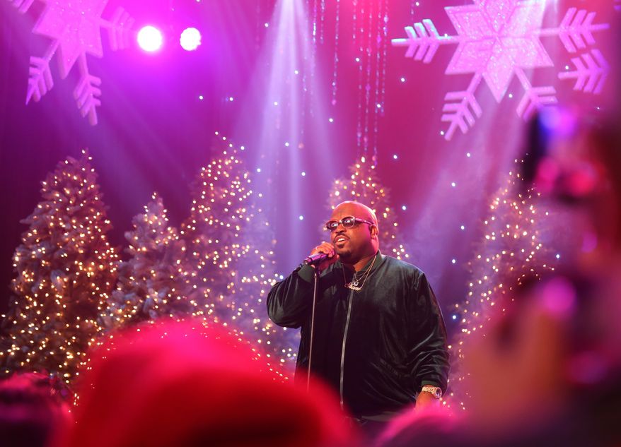 Rapper CeeLo Green performs at the annual Hollywood Christmas Parade in Los Angeles on Sunday, Nov. 26, 2017. Thousands of people lined the streets of Hollywood for the annual Christmas Parade. The crowds gathered Sunday night to watch as large balloons, musical performances and vintage cars from television shows and movies passed through Hollywood. (AP Photo/Mike Balsamo)