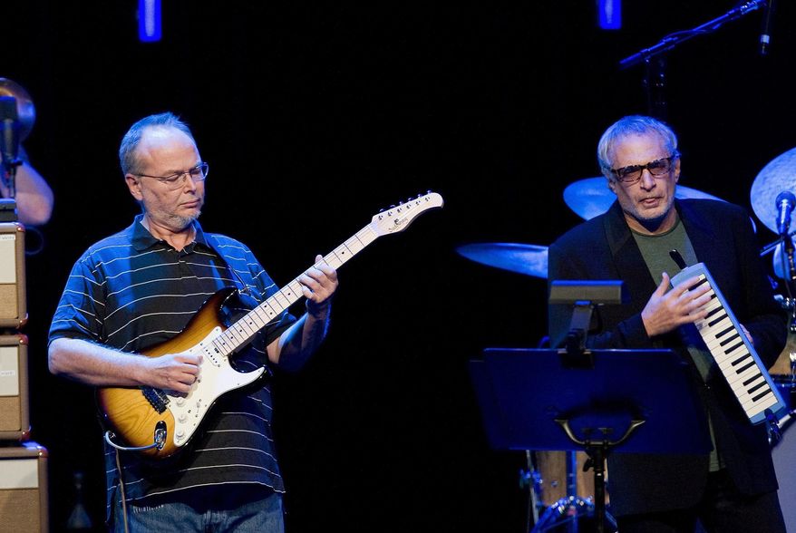 FILE - In this July 4, 2009 file photo, Walter Becker, left, and Donald Fagen, of the U.S. group Steely Dan performs at the 43nd Montreux Jazz Festival, in Montreux, Switzerland. Fagen is suing the estate of his late band mate, Becker, over ownership of the band’s name and music, a move Becker’s representatives are calling “unwarranted and frivolous.” (AP Photo/Keystone, Jean-Christophe Bott, File)