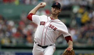 In this Sunday, Oct. 8, 2017  file photo, Boston Red Sox starting pitcher Doug Fister delivers during the first inning of Game 3 of baseball&#39;s American League Division Series against the Houston Astros in Boston. Free agent right-hander Doug Fister has signed a $4 million deal with the Texas Rangers, who are still in the market for more starting pitching. The Rangers announced the deal Tuesday, Nov. 28, 2017 after Fister had completed a physical.(AP Photo/Charles Krupa, File)