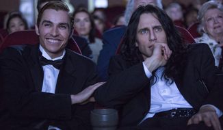 This image released by A24 shows Dave Franco, left, and James Franco in a scene from &amp;quot;The Disaster Artist.&amp;quot; (Justina Mintz/A24 via AP)