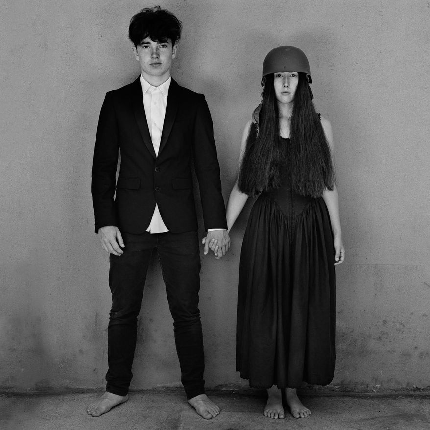 This cover image released by Interscope records shows &amp;quot;Songs of Experience,&amp;quot; by U2. (Interscope via AP)