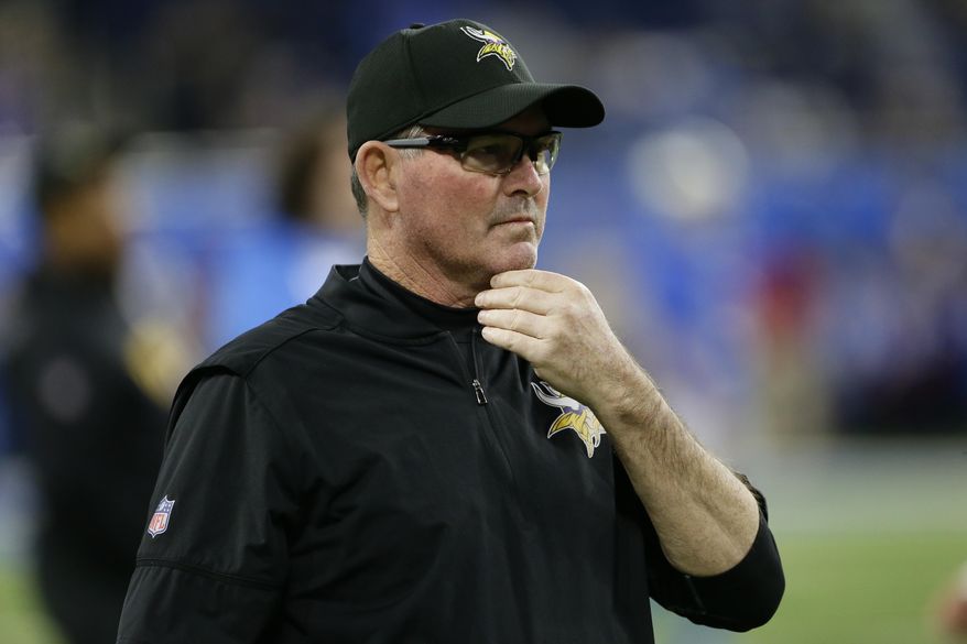 FILE - In this Nov. 23, 2017, file photo, Minnesota Vikings head coach Mike Zimmer watches from the sidelines before an NFL football game against the Detroit Lions, in Detroit. The Vikings are in control of a prime spot in the playoffs with five games to go, but there's no time to look at seeding scenarios or competitor schedules. The NFC race is stacked, leaving little room for lapses.(AP Photo/Duane Burleson, File)
