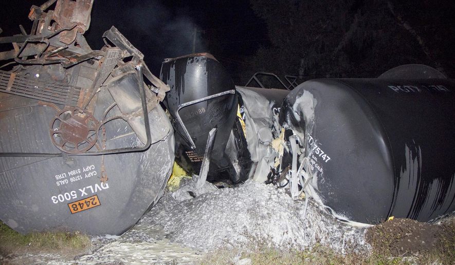 This photo made available by Polk County Fire Rescue shows molten sulfur that spilled from a derailed train near Lakeland, Fla., Monday, Nov. 27, 2017. State officials are investigating the crash. (Polk County Fire Rescue via AP)