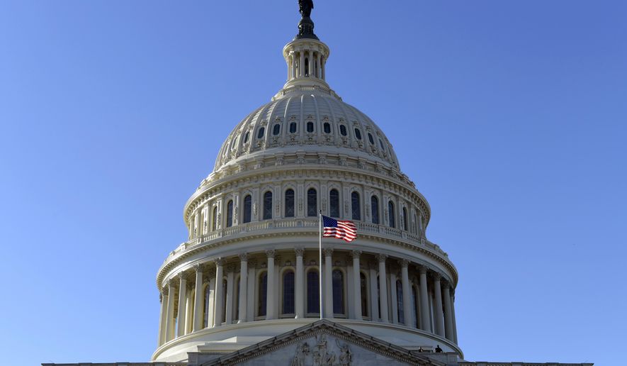 A flag flies on at the U.S. Capitol in Washington, Tuesday, Nov. 28, 2017. The House is scheduled to vote on adopting mandatory anti-sexual harassment training for all members and their staff. The vote comes amid a wave of allegations of sexual misconduct against lawmakers that has thrust the issue of gender hostility and discrimination on Capitol Hill squarely into the spotlight. (AP Photo/Susan Walsh)